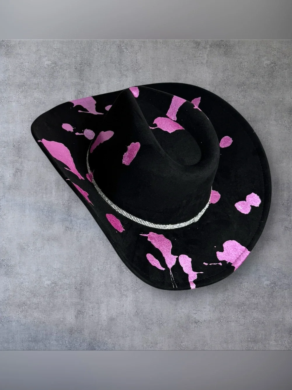 Black Cowboy Hat with Pink Accents and Star Embellishments
